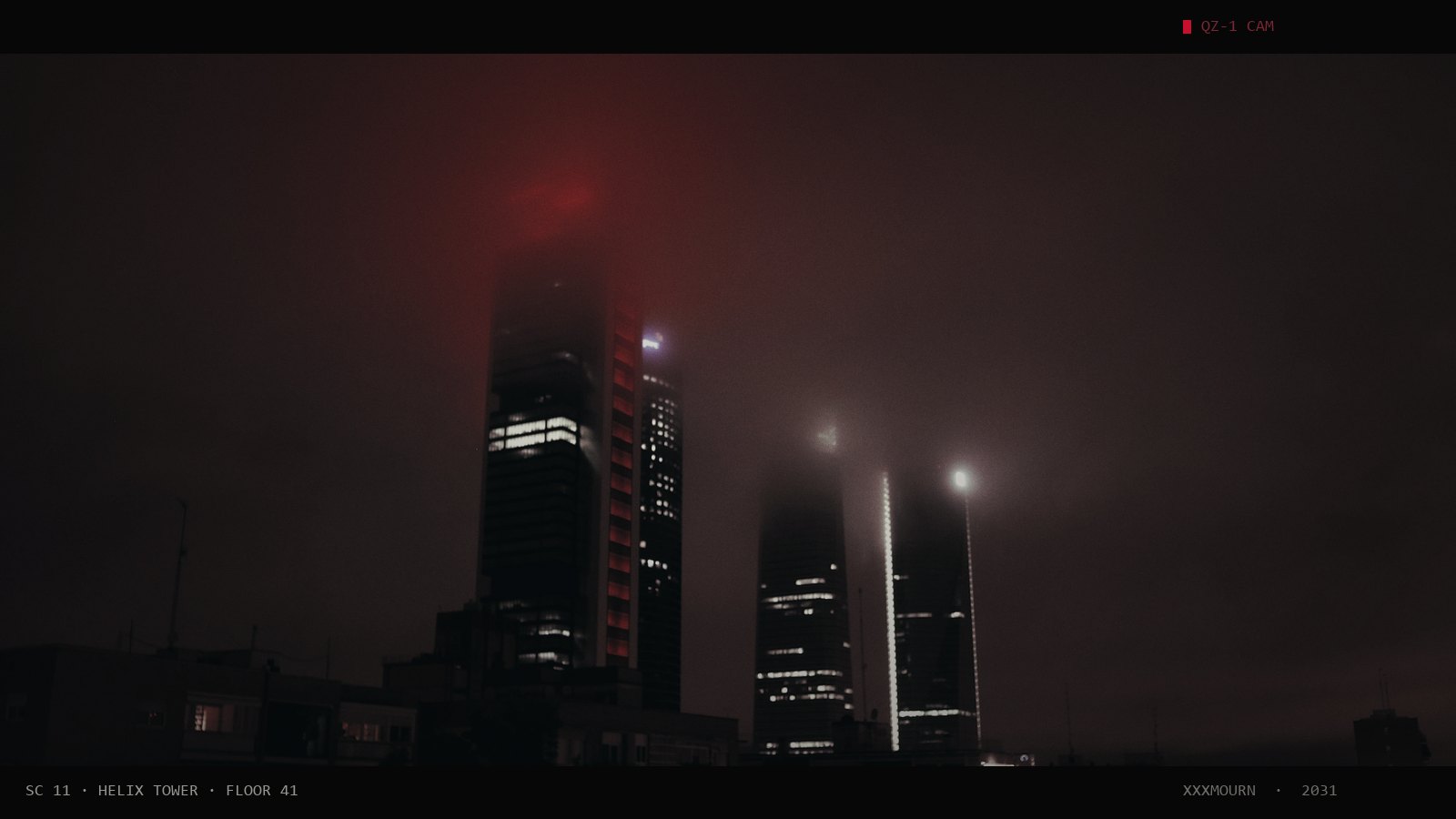 Skyscraper in fog at night with a red light burning at the top